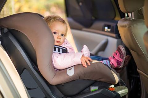 Infant baby girl in car seat; Shutterstock ID 118334788; purchase_order: aljazeera ; job: ; client: ; other: