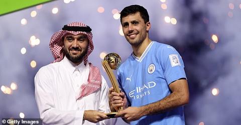 JEDDAH, SAUDI ARABIA - DECEMBER 22: Rodri of Manchester City is presented the Golden Ball award following the FIFA Club World Cup Saudi Arabia 2023 Final between Manchester City and Fluminense at King Abdullah Sports City on December 22, 2023 in Jeddah, Saudi Arabia. (Photo by Francois Nel/Getty Images)