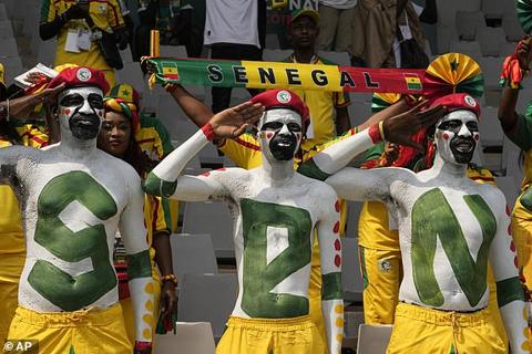 Senegal supporters cheer at the stand prior the African Cup of Nations Group C soccer match between Senegal and Gambia at the Charles Konan Banny stadium in Yamoussoukro, Ivory Coast, Monday, Jan. 15, 2024. (AP Photo/Sunday Alamba)