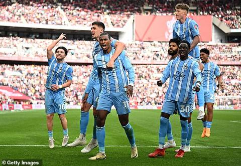 LONDON, ENGLAND - APRIL 21: Haji Wright celebrates scoring his team s third goal from the penalty spot with Fabio Tavares of Coventry City during the Emirates FA Cup Semi Final match between Coventry City and Manchester United at Wembley Stadium on April 21, 2024 in London, England. (Photo by Mike Hewitt/Getty Images)