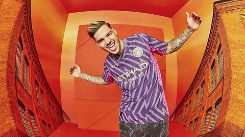 Goalkeeper Ederson strikes a pose with the launch inspired by Manchester s rich history