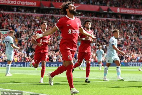 Mo Salah celebrates scoring his team s second goal over Bournemouth at Anfield on Saturday