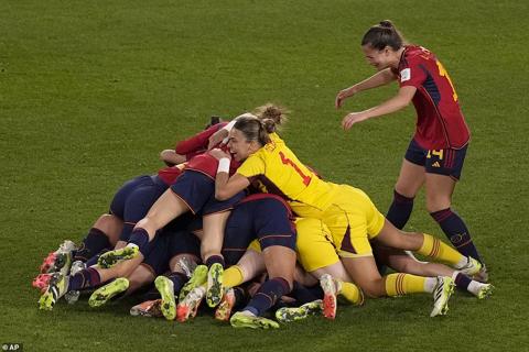 Victors Spain celebrated joyously after beating England to win the Women s World Cup at the Stadium Australia in Sydney
