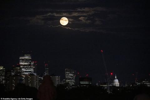 LONDON: The rare Super Blue Moon illuminates the night sky including landmarks such at St Pauls in London