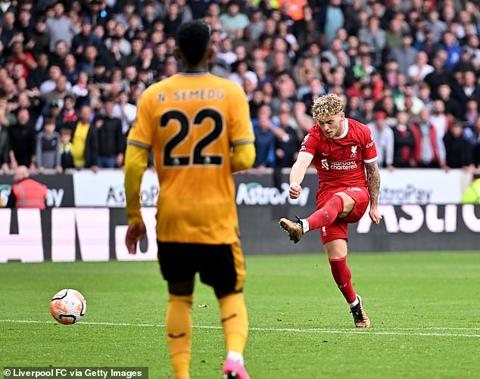 Harvey Elliott s (right) deflected shot off Hugo Bueno helped Liverpool add a third goal to their tally