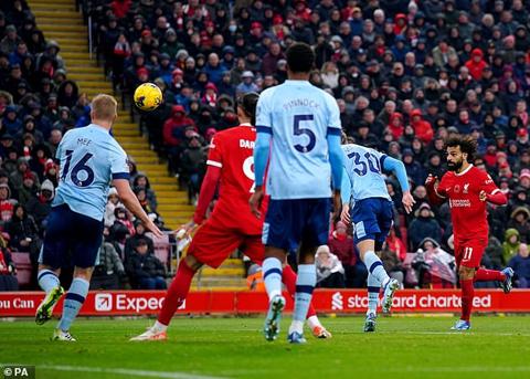 Salah scores his and Liverpool s second goal at Anfield to achieve his 200-goal milestone
