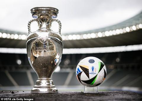 The ball is seen alongside the European Championship trophy at Berlin s Olympiastadion