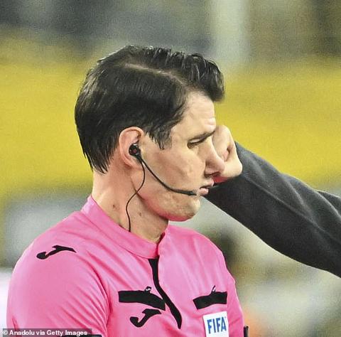 The moment that the fist of Faruk Koca, president of MKE Ankaragucu, connects with the face of referee Halil Umut Meler after a Turkish Super Lig match on Monday evening