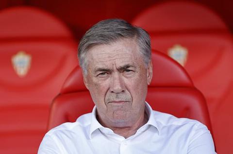 Real Madrid s head coach Carlo Ancelotti waits for the start of a Spanish La Liga soccer match between Almeria and Real Madrid at the Power Horse Stadium in Almeria, Spain, Saturday, Aug. 19, 2023. (AP Photo/Fermin Rodriguez)