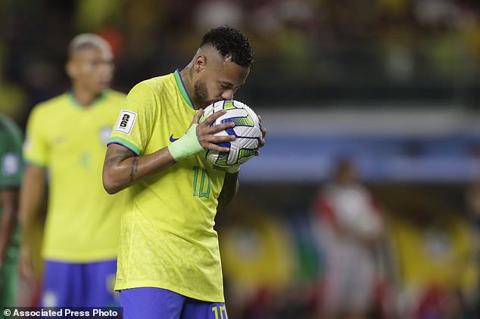 Brazil s Neymar kisses the ball before failing a penalty kick during a qualifying soccer match for the FIFA World Cup 2026 against Bolivia at Mangueirao stadium in Belem, Brazil, Friday, Sept. 8, 2023. (AP Photo/Bruna Prado)