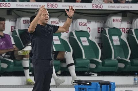 Germany head coach Hansi Flick gestures during an international friendly soccer match between Germany and Japan in Wolfsburg, Germany, Saturday, Sept. 9, 2023. (AP Photo/Martin Meissner)