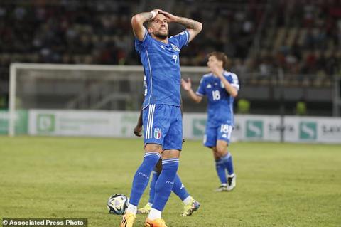 Italy s Cristiano Biraghi reacts during the Euro 2024 group C qualifying soccer match between North Macedonia and Italy at National Arena Todor Proeski in Skopje, North Macedonia, Saturday, Sept. 9, 2023. (AP Photo/Boris Grdanoski)