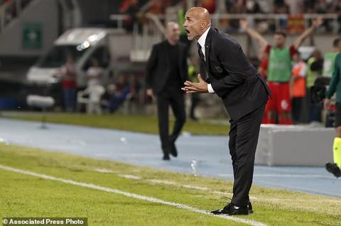Italy coach Luciano Spalletti calls out to his players during the Euro 2024 group C qualifying soccer match between North Macedonia and Italy at National Arena Todor Proeski in Skopje, North Macedonia, Saturday, Sept. 9, 2023. (AP Photo/Boris Grdanoski)