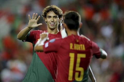 Portugal s Ricardo Horta celebrates with Joao Felix, left, after scoring his side s sixth goal during the Euro 2024 group J qualifying soccer match between Portugal and Luxembourg at the Algarve stadium outside Faro, Portugal, Monday, Sept. 11, 2023. (AP Photo/Joao Matos)