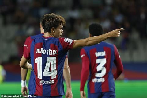 Barcelona s Joao Felix celebrates after scoring his side s opening goal during the Champions League Group H soccer match between Barcelona and Royal Antwerp at the Olympic Stadium of Montjuic in Barcelona, Spain, Tuesday, Sept. 19, 2023. (AP Photo/Joan Monfort)