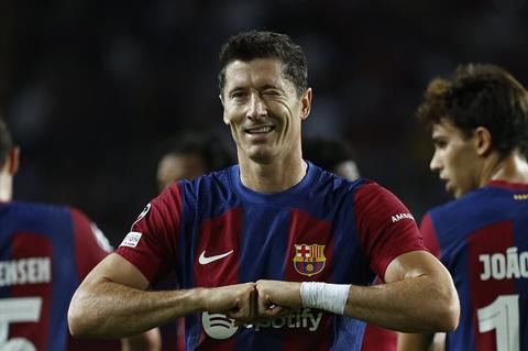 Barcelona s Robert Lewandowski celebrates after scoring his side s second goal during the Champions League Group H soccer match between Barcelona and Royal Antwerp at the Olympic Stadium of Montjuic in Barcelona, Spain, Tuesday, Sept. 19, 2023. (AP Photo/Joan Monfort)
