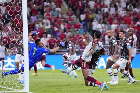 Al Ahly s Kahraba, center, tries to score during the Soccer Club World Cup semifinal soccer match between Fluminense FC and Al Ahly FC at King Abdullah Sports City Stadium in Jeddah, Saudi Arabia, Monday, Dec. 18, 2023. (AP Photo/Manu Fernandez)