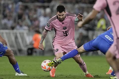 Inter Miami s Lionel Messi is fouled by Monterrey Sergio Canales during a CONCACAF Champions Cup quarter final second leg soccer match at the BBVA stadium in Monterrey, Mexico, Wednesday, April 10, 2024. (AP Photo/Eduardo Verdugo)