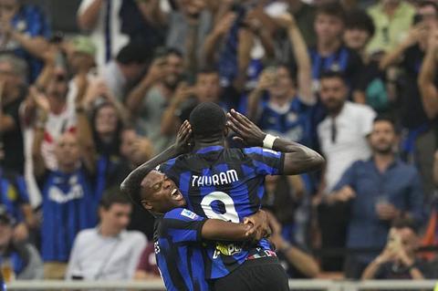 FILE - Inter Milan s Marcus Thuram celebrates after scoring his side s 2nd goal during a Serie A soccer match between Inter Milan and AC Milan at the San Siro stadium in Milan, Italy, Sept. 16, 2023. A 2-1 victory over AC Milan in the derby has given Inter Milan a 20th Serie A title and a second star on the team shirts.(AP Photo/Antonio Calanni, File)