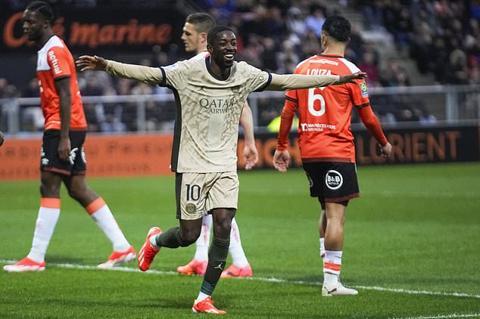 PSG s Ousmane Dembele celebrates scoring his side s third goal during the French League One soccer match between Lorient and Paris Saint-Germain at the Moustoir stadium in Lorient, Brittany, western France, Wednesday, April 24, 2024. (AP Photo/Michel Euler)